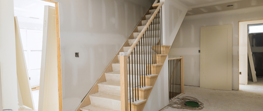 A home stairway under construction, showcasing the progress of home remodeling in Boise.