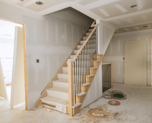 A home stairway under construction, showcasing the progress of home remodeling in Boise.